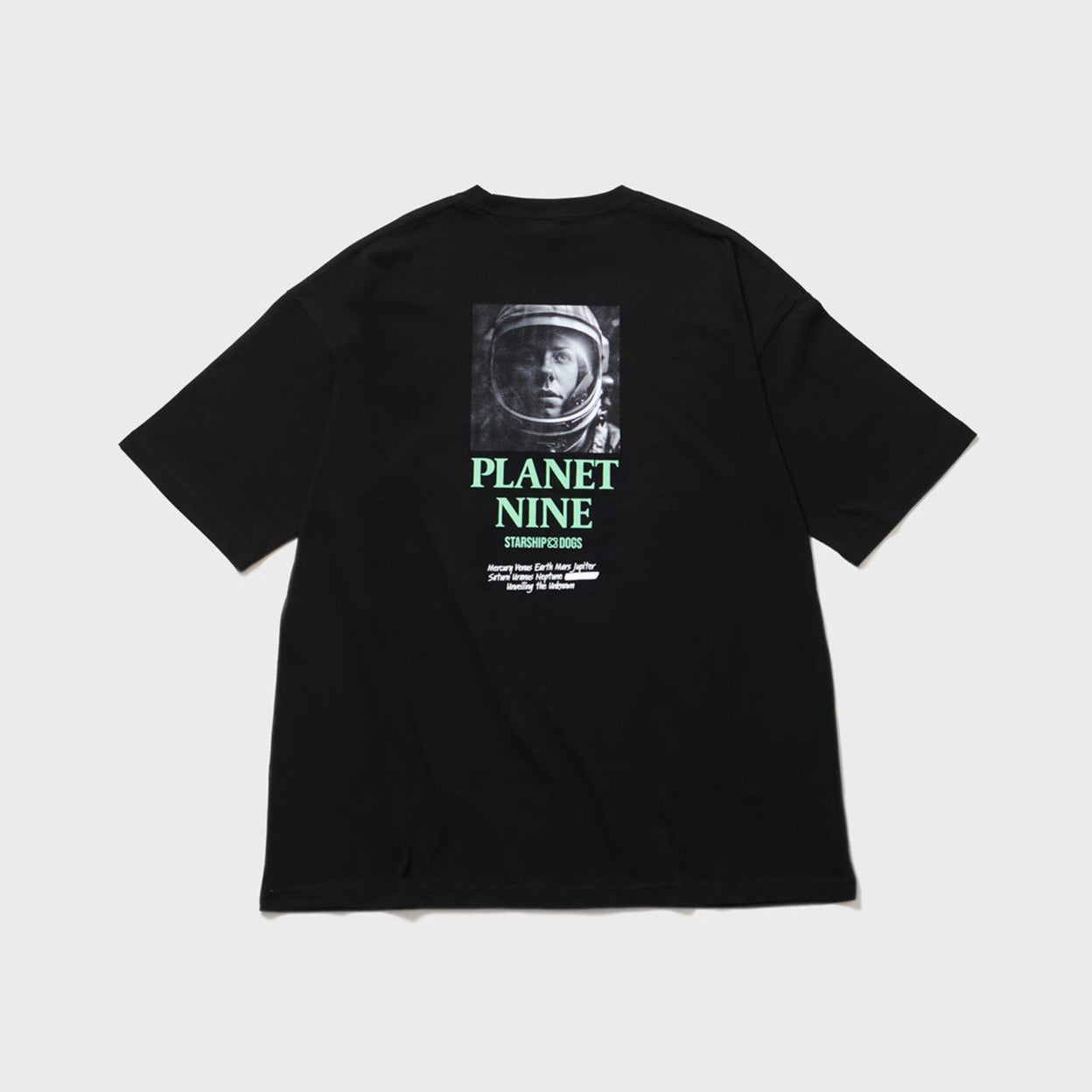 Product Photo: Body color Black. Back print featuring a monochrome photo of a female astronaut and silk-screen printed 'PLANET NINE' (text color light green).