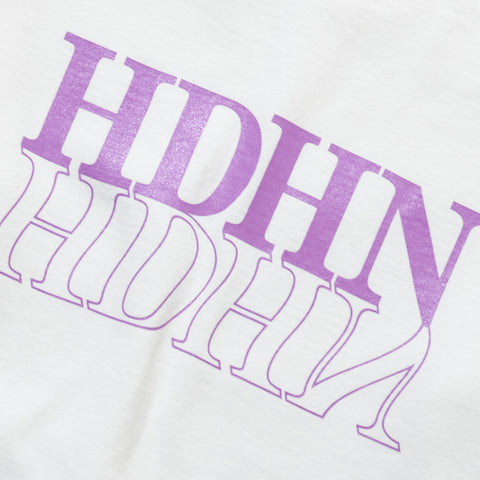 Further Zoomed-In on the Print Section of the Product: A white cool sweatshirt. The fabric texture is soft and gentle to the touch.
